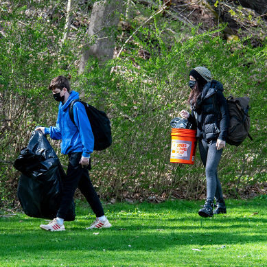 A group cleans up near the river
